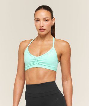 Спортивний бра Gymshark &laquo;Light Support Ruche Strappy Back&raquo; &mdash; колір: Бірюзовий &mdash; Extra Small B7C1M-TBTP-XS фото